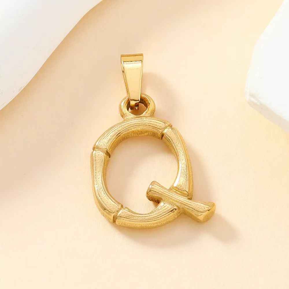 Loopbrek - custom initial necklace - Bamboo-Shaped Initial Charm - zoom in