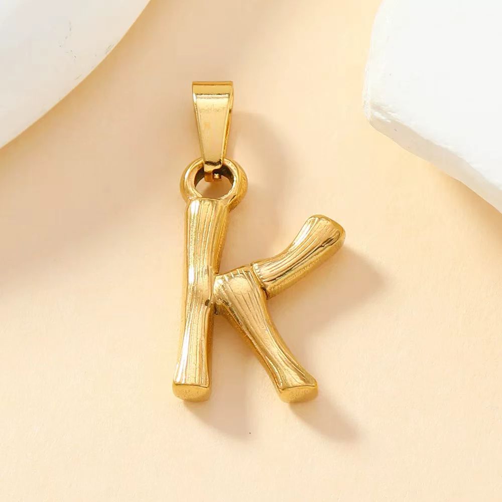 Loopbrek - custom initial necklace - Bamboo-Shaped Initial Charm - zoom in