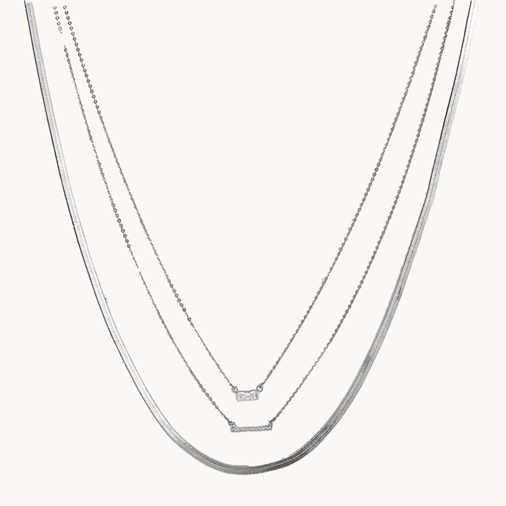 Loopbrek-layered necklaces-The Triple Charm · Layered Necklace - zoom in-sliver